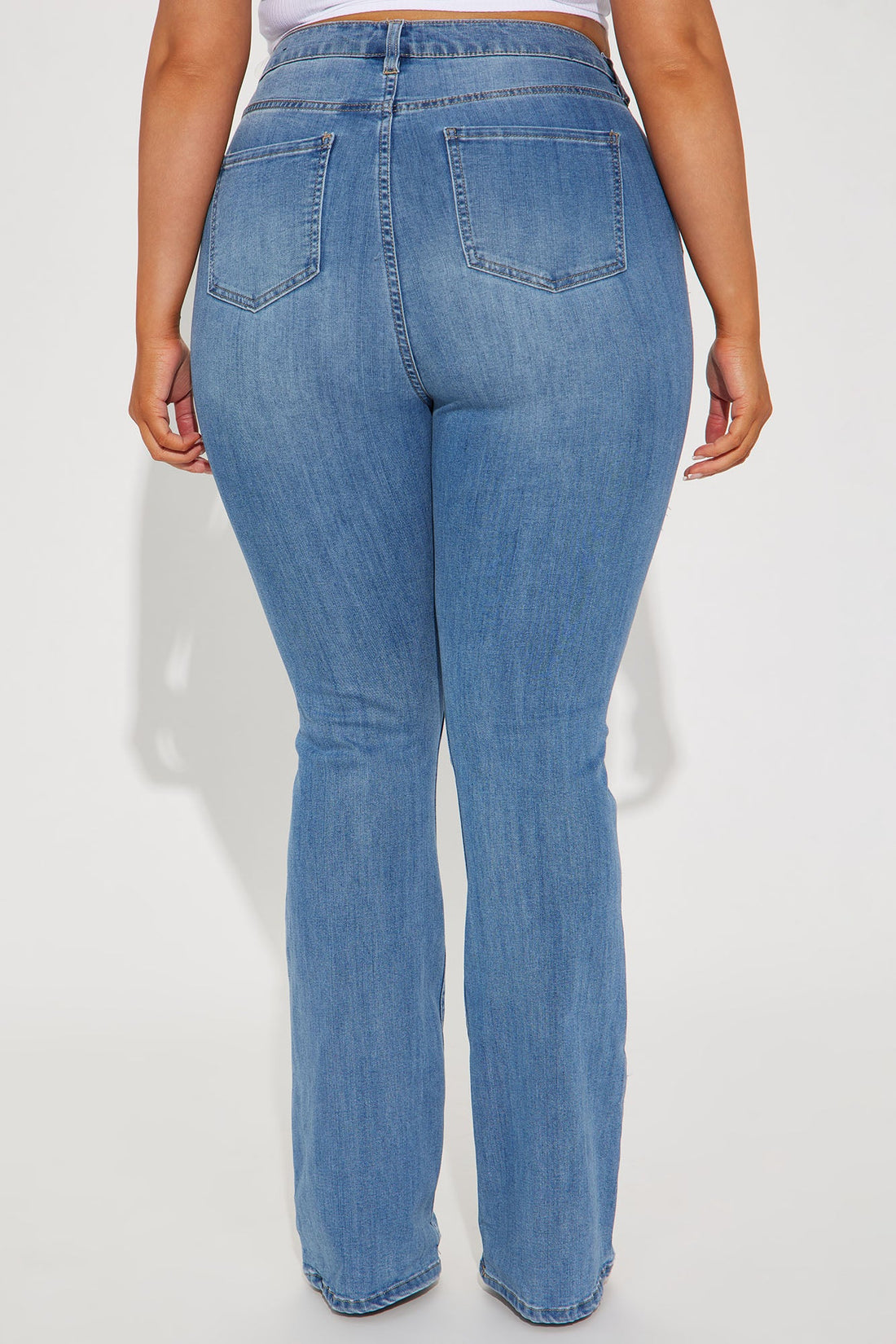 Jessie Mid Rise Distressed Bootcut Jean - Light Blue Wash