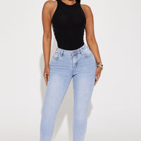 Malia Mid Rise Stretch Skinny Jeans - Light Wash