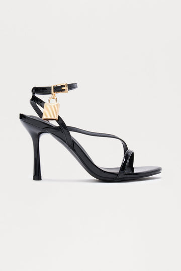 Bebe Lock Patent Heels - Black